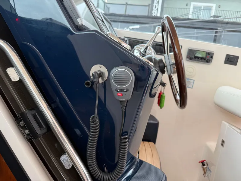 Slide: The Image of Tiara Yachts 3600 Coronet 2013 helm with microphone. - 11