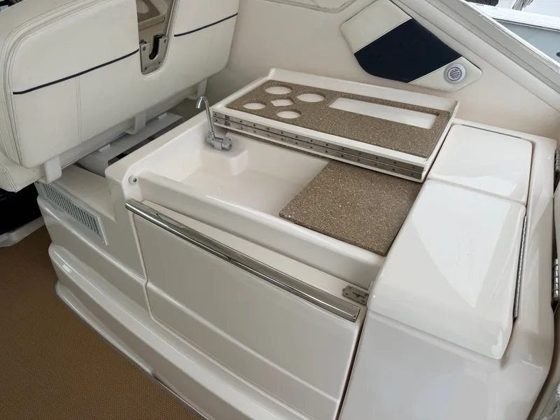 Slide: The Image of Interior of 2013 Tiara Yachts 3600 Coronet with sink and storage. - 14