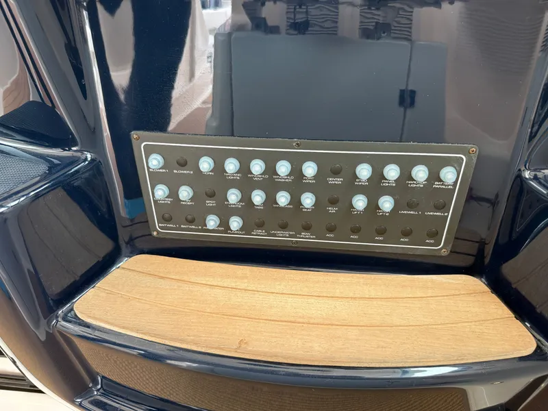 Slide: The Image of Control panel of 2013 Tiara Yachts 3600 Coronet with wood trim. - 18