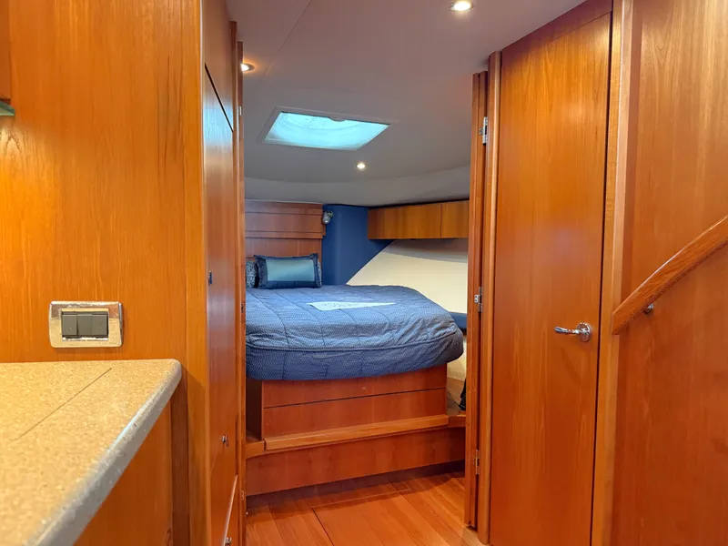 Slide: The Image of Interior of 2013 Tiara Yachts 3600 Coronet featuring cozy bedroom. - 37