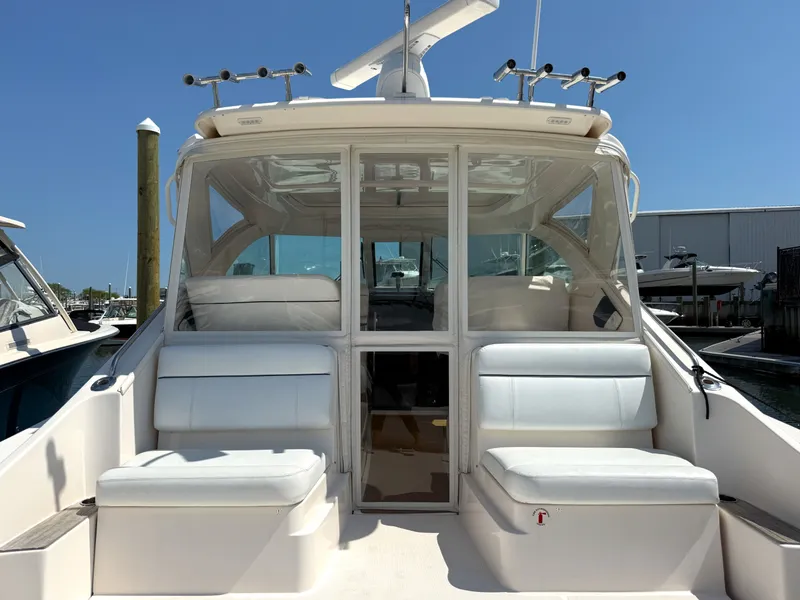 Slide: The Image of 2013 Tiara Yachts 3600 Coronet with white outdoor seating area. - 4