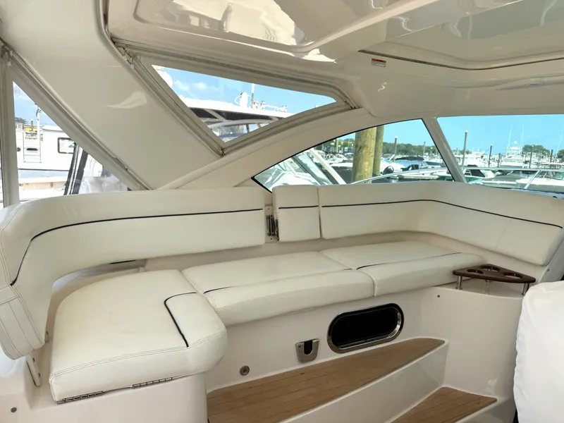 Slide: The Image of 2013 Tiara Yachts 3600 Coronet interior with white seating. - 7