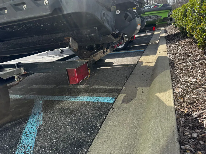 Slide: The Image of 2011 Sea-Doo RXT 260 on trailer in parking lot. - 5