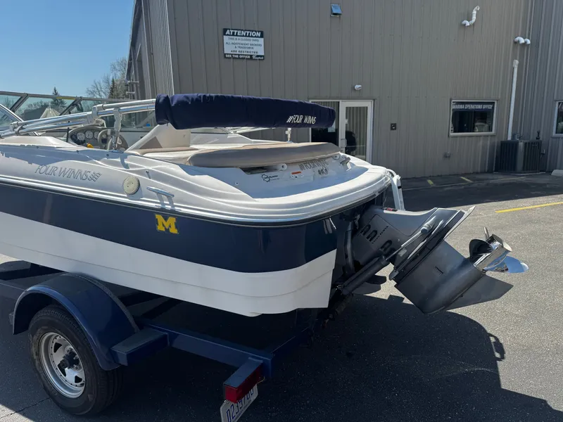 Slide: The Image of 2006 Four Winns 180 Horizon boat on trailer, exterior view. - 3