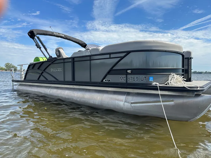 The Image of 2022 Sylvan L3 CLZ TT pontoon boat on the water. - 0