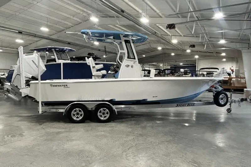 The Image of 2026 Tidewater 2500 Carolina Bay boat in showroom, on trailer, side view. - 0