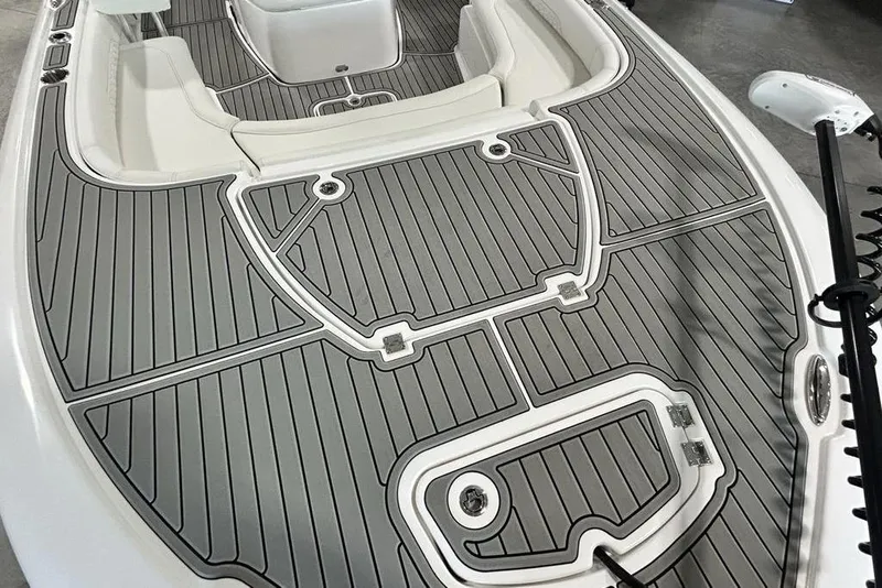 Slide: The Image of 2026 Tidewater 2500 Carolina Bay boat deck with sleek, modern design and gray flooring. - 13