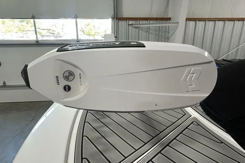 Slide: The Image of Close-up of a 2026 Tidewater 2500 Carolina Bay boat accessory in a garage. - 7