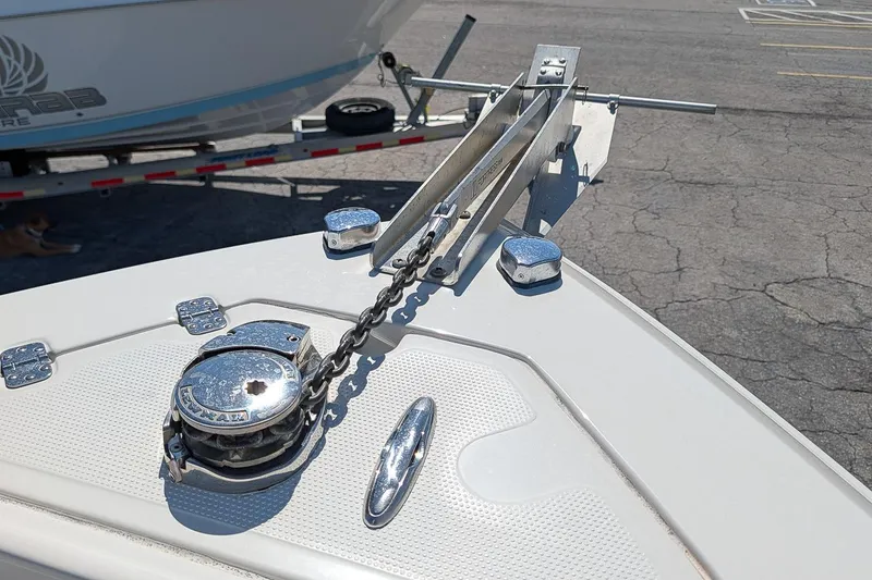 Slide: The Image of Bow of 2014 Sailfish 270 CC boat with anchor chain and winch. - 22