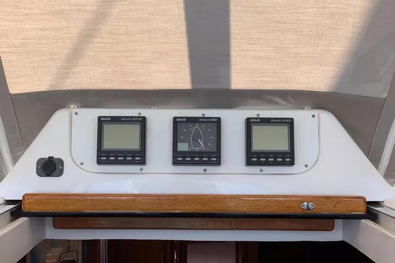 Slide: The Image of Control panel of a 2000 Hunter 460 sailboat with B&G instruments. - 24
