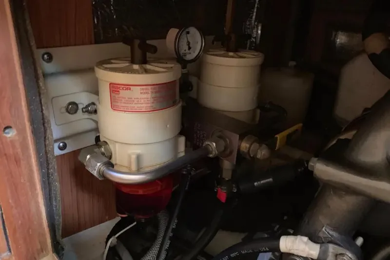 Slide: The Image of Fuel filter system in a 2000 Hunter 460 boat engine compartment. - 62