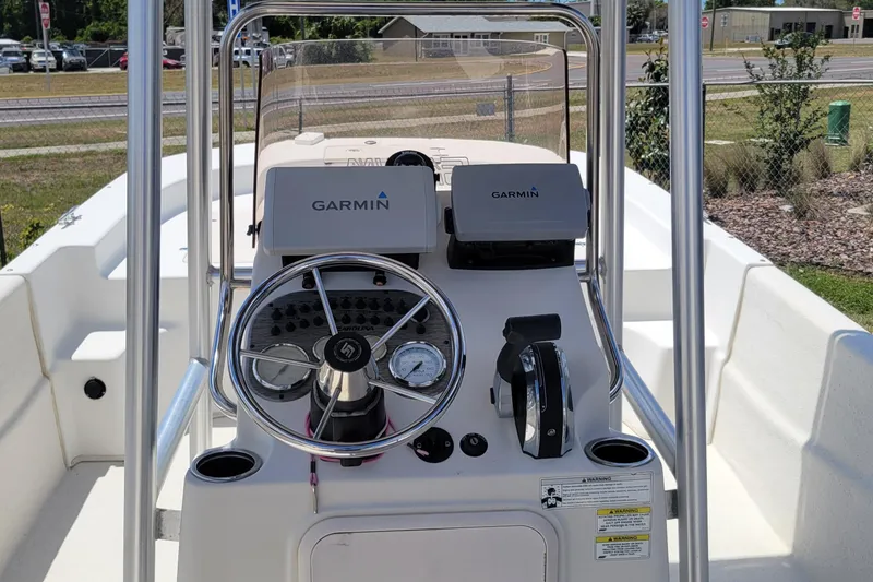 Slide: The Image of 2014 Carolina Skiff 218 DLV boat console with Garmin navigation system. - 9