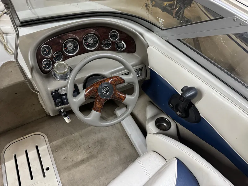 Slide: The Image of Interior view of a 2010 Crownline 180 BR boat cockpit. - 4