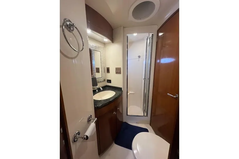 Slide: The Image of Bathroom interior of 2000 Carver 506 Motor Yacht with shower and vanity. - 19