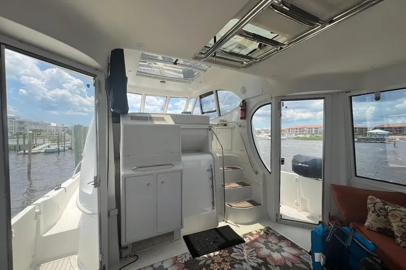 Slide: The Image of Interior of 2000 Carver 506 Motor Yacht with scenic marina view. - 24