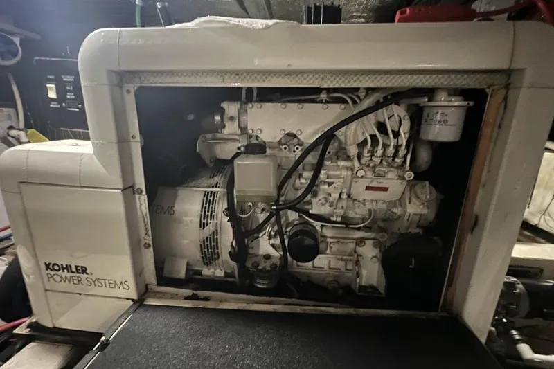 Slide: The Image of Kohler power system inside a 2000 Carver 506 Motor Yacht engine room. - 34