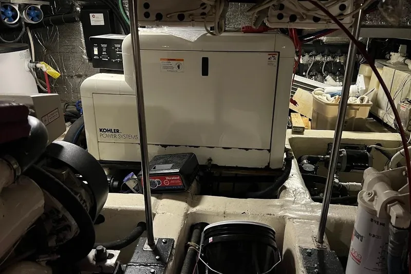Slide: The Image of Engine room of a 2000 Carver 506 Motor Yacht with Kohler power systems. - 35