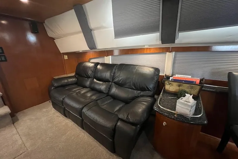 Slide: The Image of Luxurious interior of 2000 Carver 506 Motor Yacht with leather seating and elegant decor. - 7