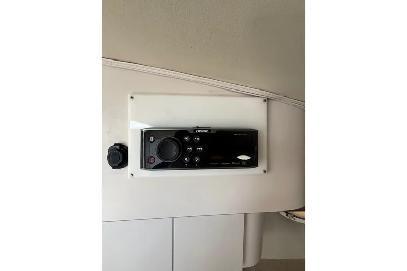 Slide: The Image of Audio control panel on a 1992 Wellcraft 3400 Gran Sport boat interior. - 20