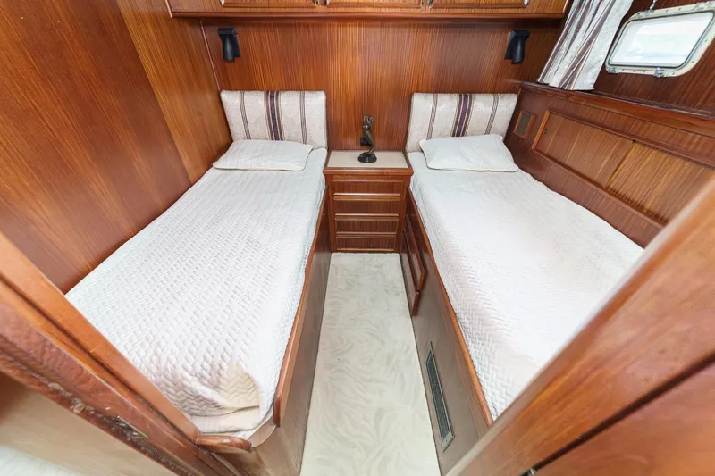 Slide: The Image of Twin cabin with wood paneling in 1979 Hatteras 58 Motor Yacht. - 53