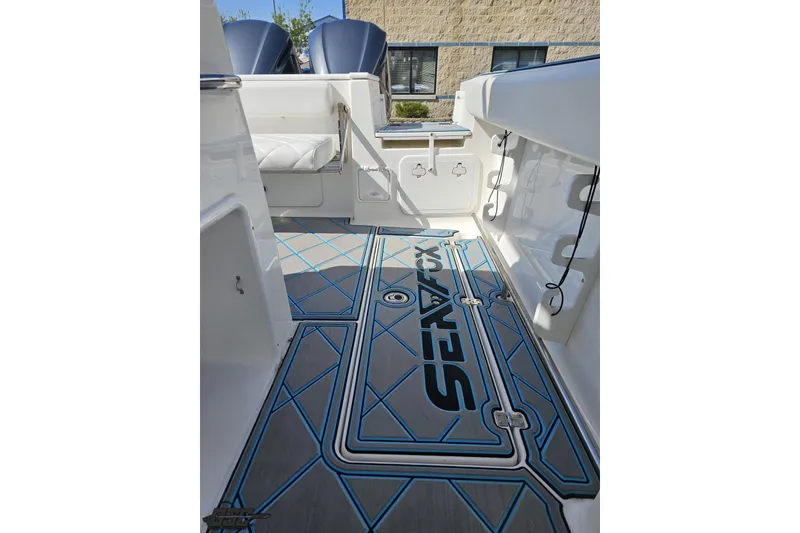 Slide: The Image of 2013 Sea Fox 286 Commander boat interior with custom flooring and seating. - 102