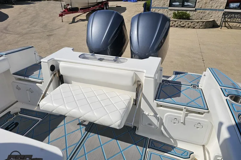 Slide: The Image of 2013 Sea Fox 286 Commander boat interior with dual engines and foldable seating. - 103
