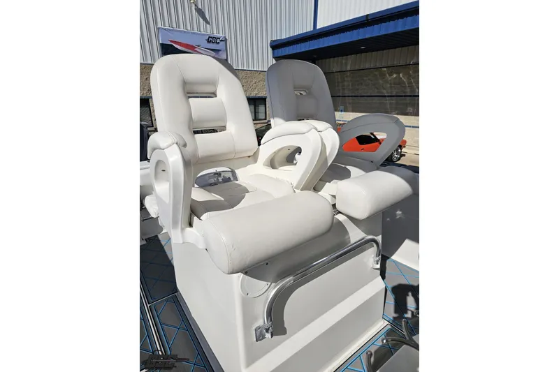Slide: The Image of 2013 Sea Fox 286 Commander boat seats, featuring plush white upholstery and ergonomic design. - 107
