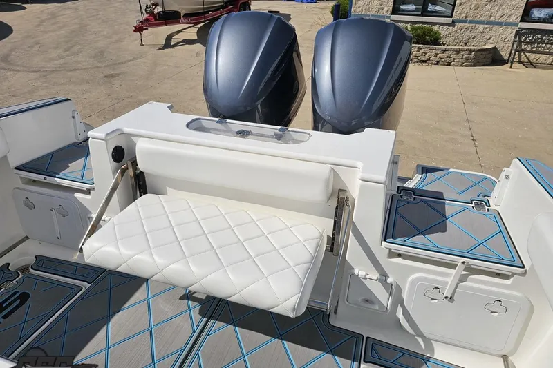 Slide: The Image of 2013 Sea Fox 286 Commander boat with dual engines and foldable white seat. - 113