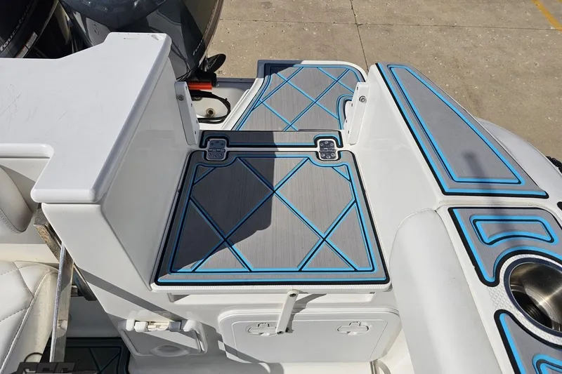 Slide: The Image of 2013 Sea Fox 286 Commander boat deck with blue-accented non-slip surface. - 114
