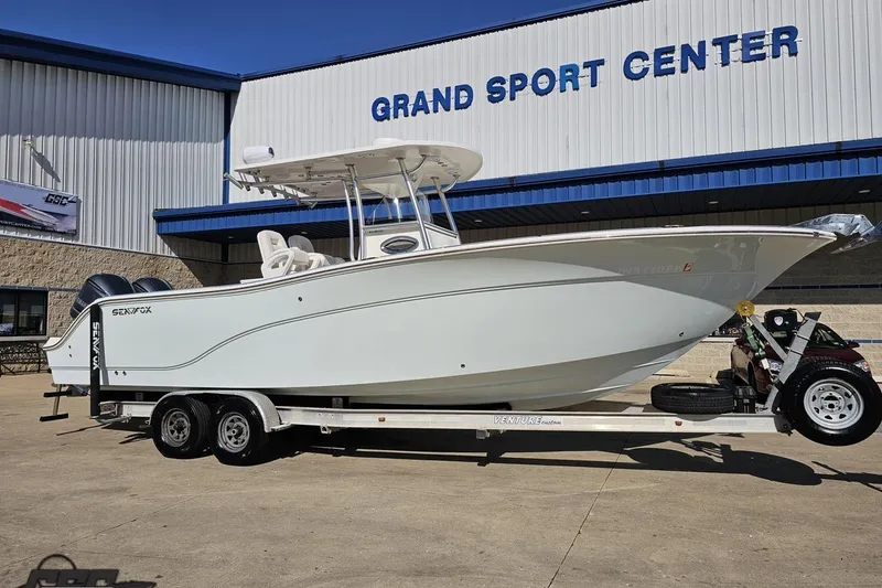 Slide: The Image of 2013 Sea Fox 286 Commander boat on trailer at Grand Sport Center. - 12