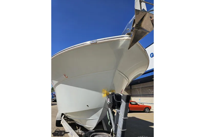 Slide: The Image of 2013 Sea Fox 286 Commander boat on trailer under clear blue sky. - 16