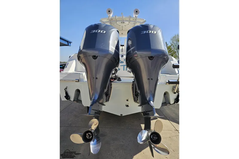 Slide: The Image of Twin 300 horsepower engines on a 2013 Sea Fox 286 Commander boat. - 34