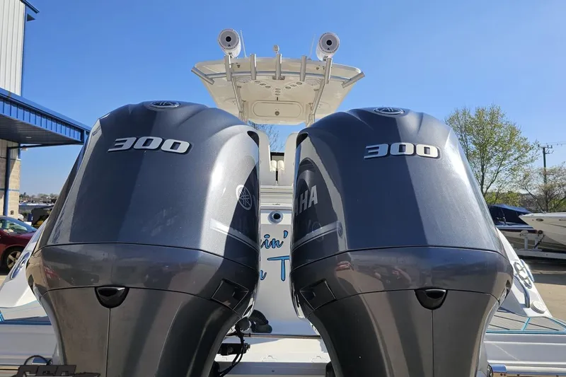 Slide: The Image of Twin Yamaha 300 engines on a 2013 Sea Fox 286 Commander boat. - 35