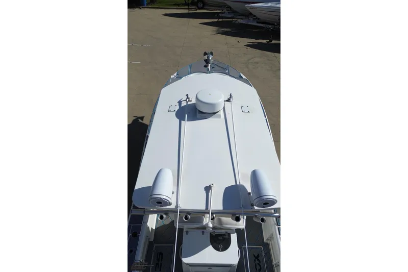 Slide: The Image of Top view of a 2013 Sea Fox 286 Commander boat docked on concrete. - 43