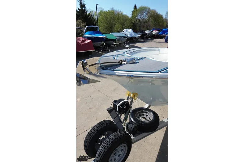 Slide: The Image of 2013 Sea Fox 286 Commander boat on trailer in outdoor storage area. - 45