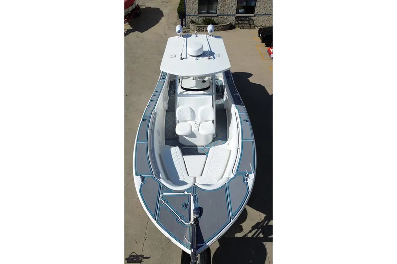 Slide: The Image of 2013 Sea Fox 286 Commander boat, aerial view showcasing deck and seating arrangement. - 46