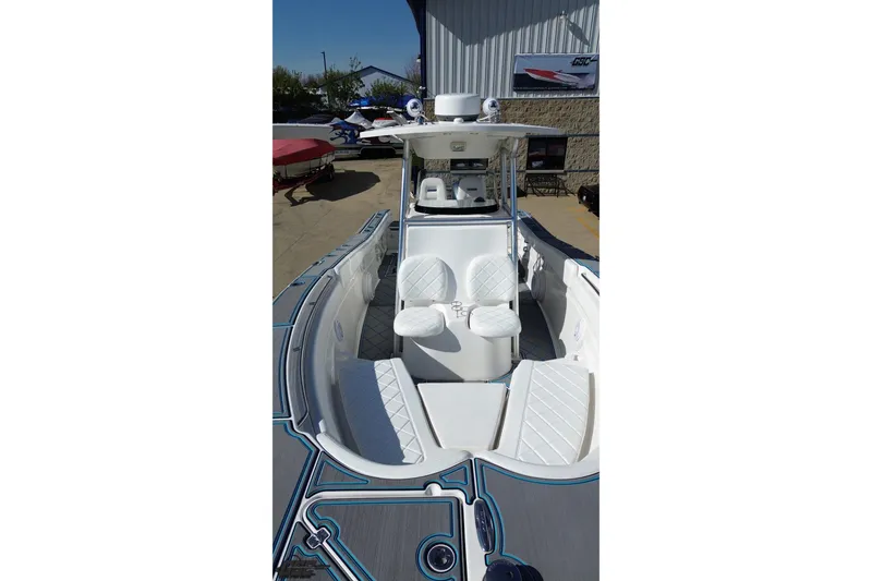 Slide: The Image of 2013 Sea Fox 286 Commander boat with white seating and sleek design. - 48