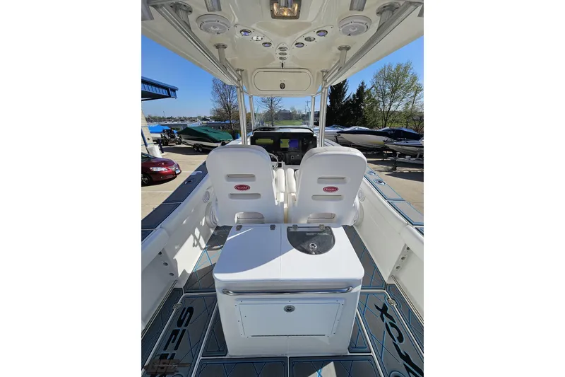 Slide: The Image of 2013 Sea Fox 286 Commander boat interior with seating and control panel. - 53