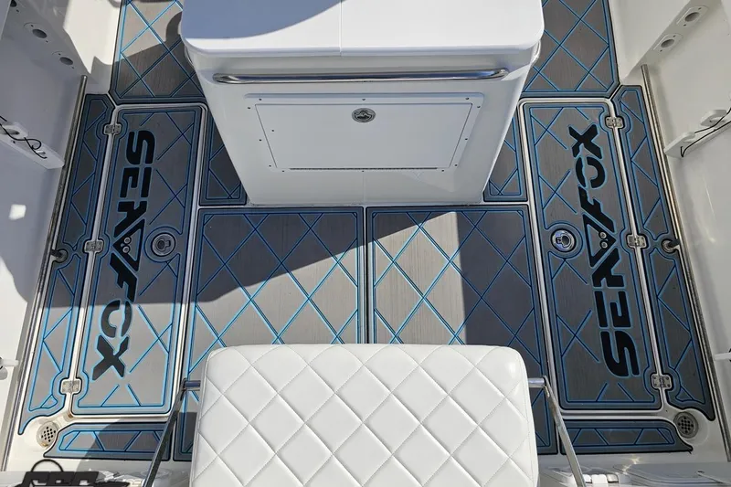 Slide: The Image of 2013 Sea Fox 286 Commander boat deck with custom Sea Fox logo mats. - 54