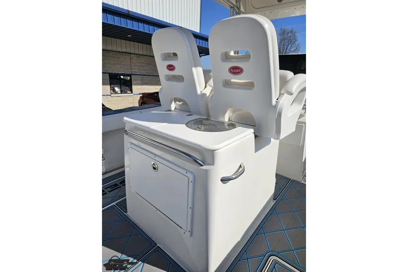 Slide: The Image of 2013 Sea Fox 286 Commander boat seating and storage area. - 57