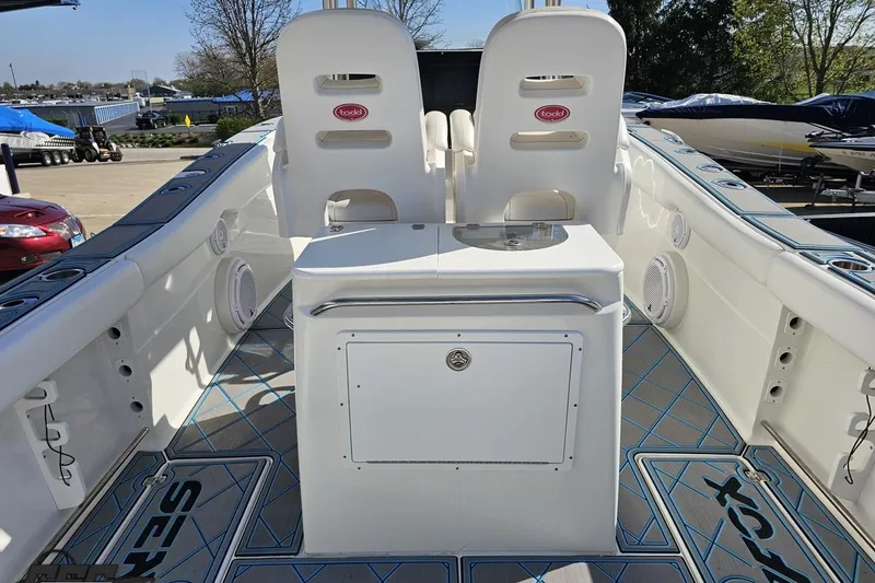 Slide: The Image of 2013 Sea Fox 286 Commander boat interior with seating and storage. - 58