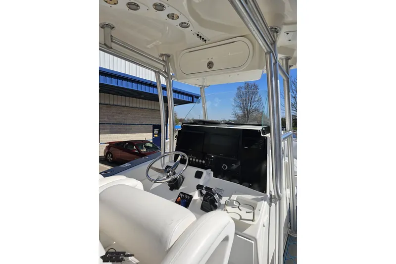 Slide: The Image of Interior view of 2013 Sea Fox 286 Commander boat cockpit with steering wheel. - 62