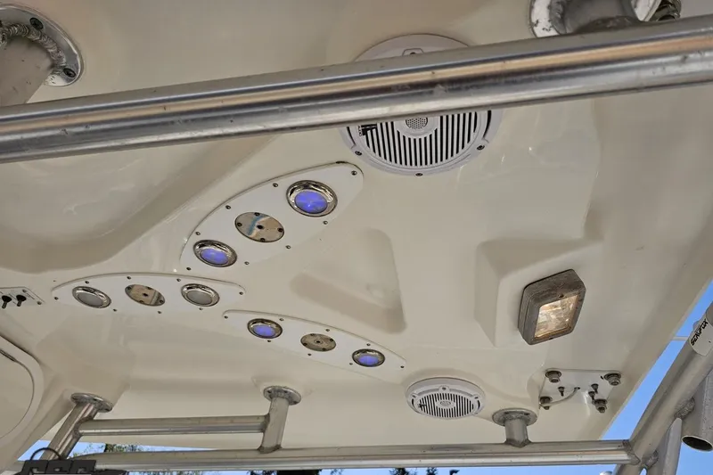 Slide: The Image of Ceiling view of a 2013 Sea Fox 286 Commander boat with integrated lights and speakers. - 73