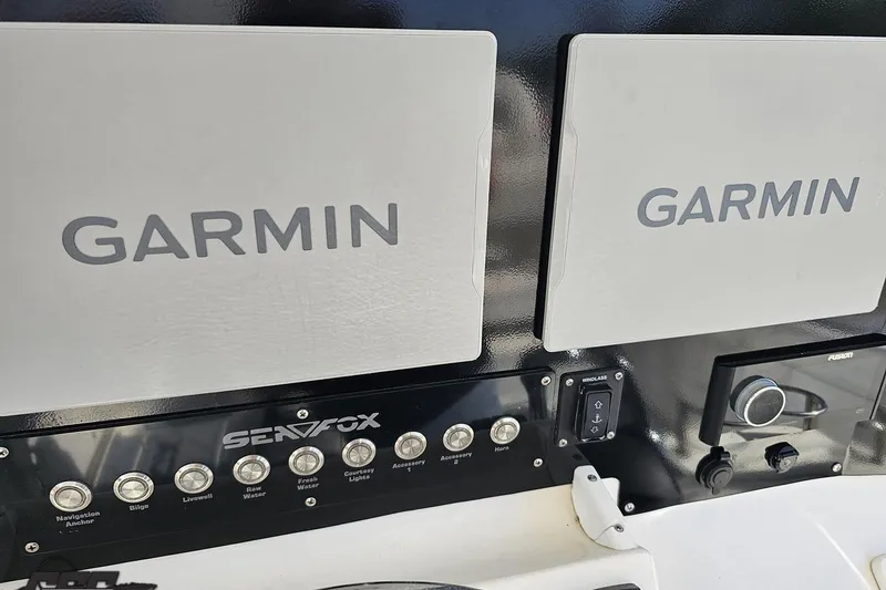 Slide: The Image of Control panel of 2013 Sea Fox 286 Commander with Garmin displays. - 75