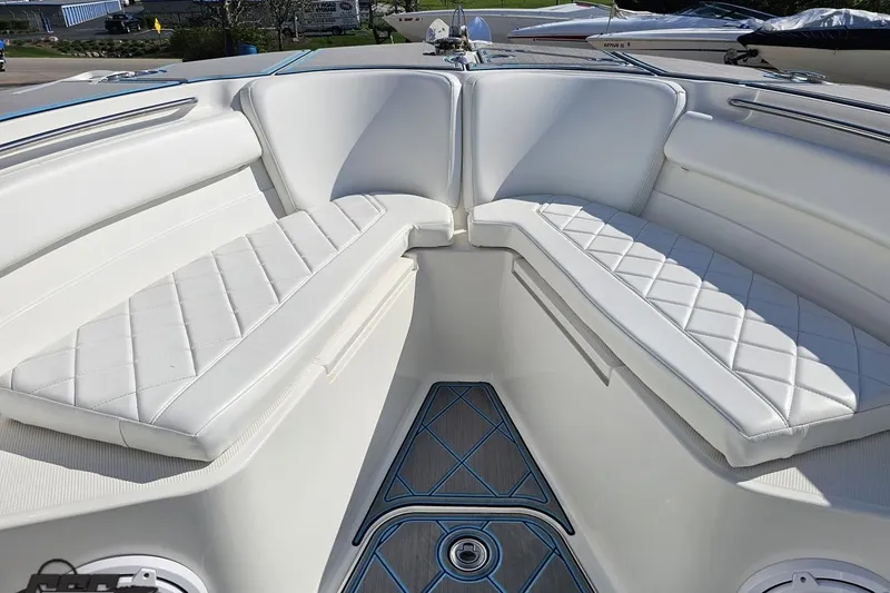 Slide: The Image of Interior view of 2013 Sea Fox 286 Commander boat with white cushioned seating. - 83