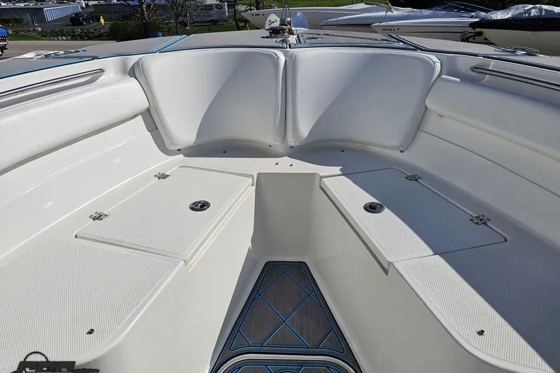 Slide: The Image of 2013 Sea Fox 286 Commander boat interior with white seating and storage compartments. - 85