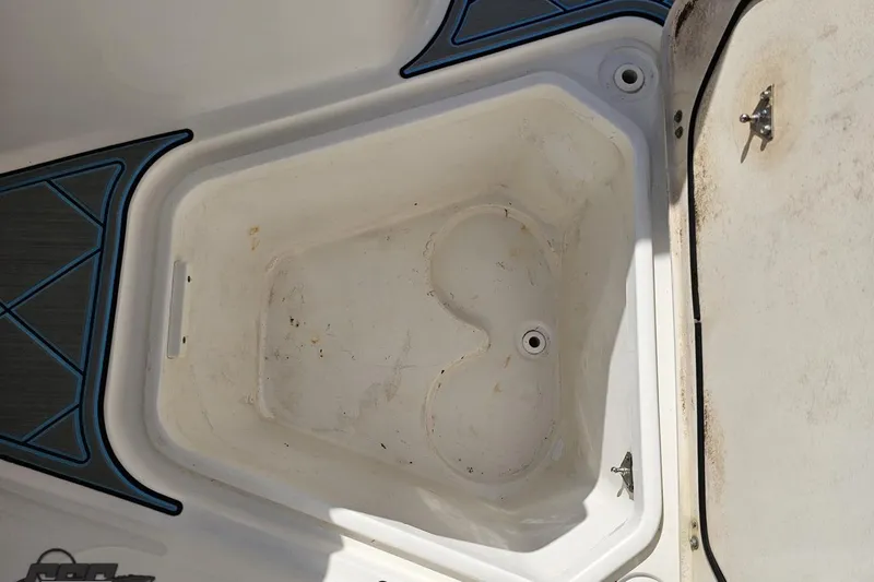 Slide: The Image of Storage compartment on a 2013 Sea Fox 286 Commander boat. - 90