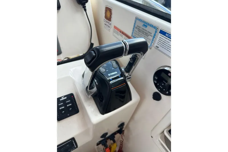 Slide: The Image of Control panel of a 2008 Pursuit OS 335 Offshore boat with Yamaha throttle. - 19