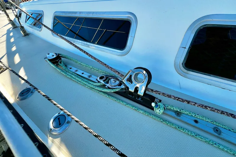 Slide: The Image of 1985 Catalina 36 sailboat deck with rigging and windows. - 10