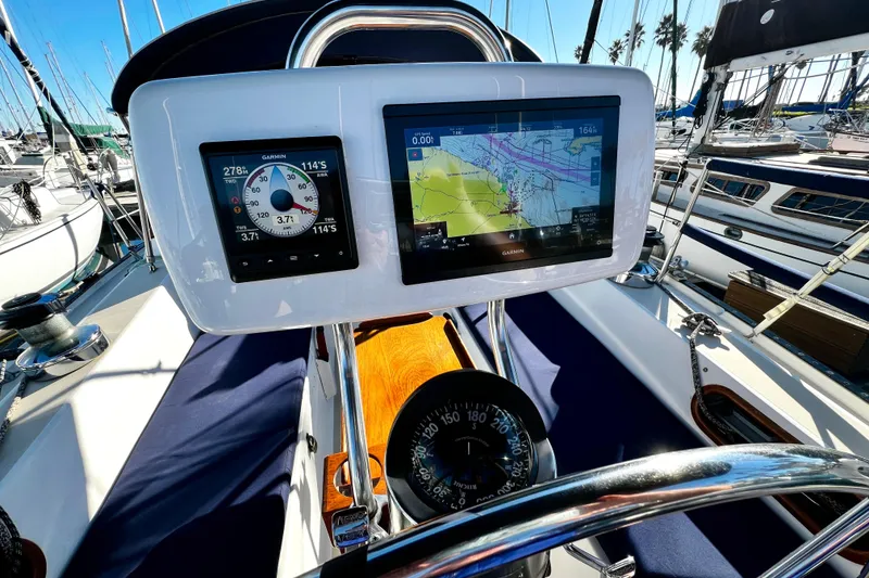 Slide: The Image of Cockpit of 1985 Catalina 36 sailboat with Garmin navigation displays and compass. - 23